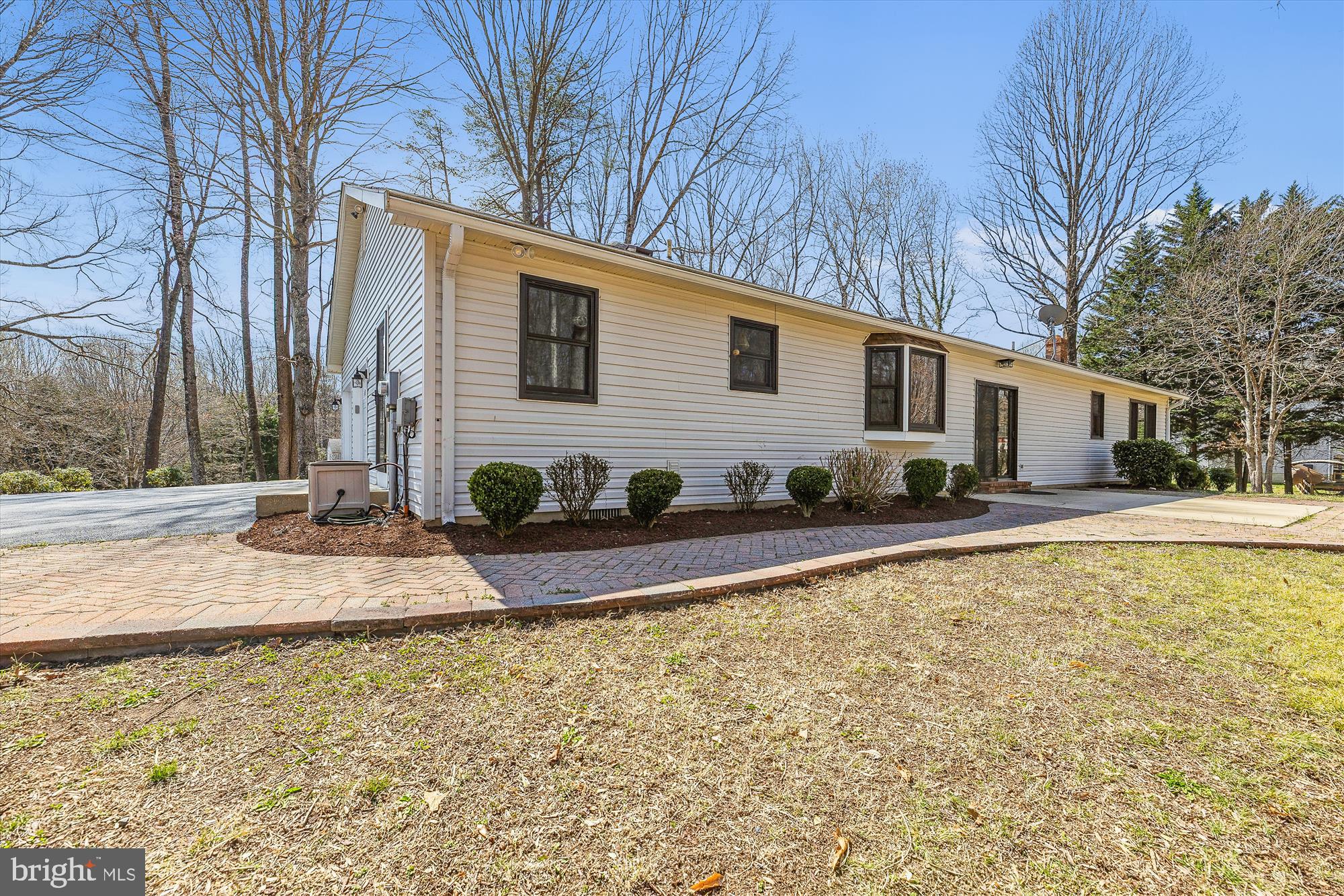16130 Inheritance Drive Brandywine, MD 20613 - Photo 27 of 39 a front view of house with yard and seating area