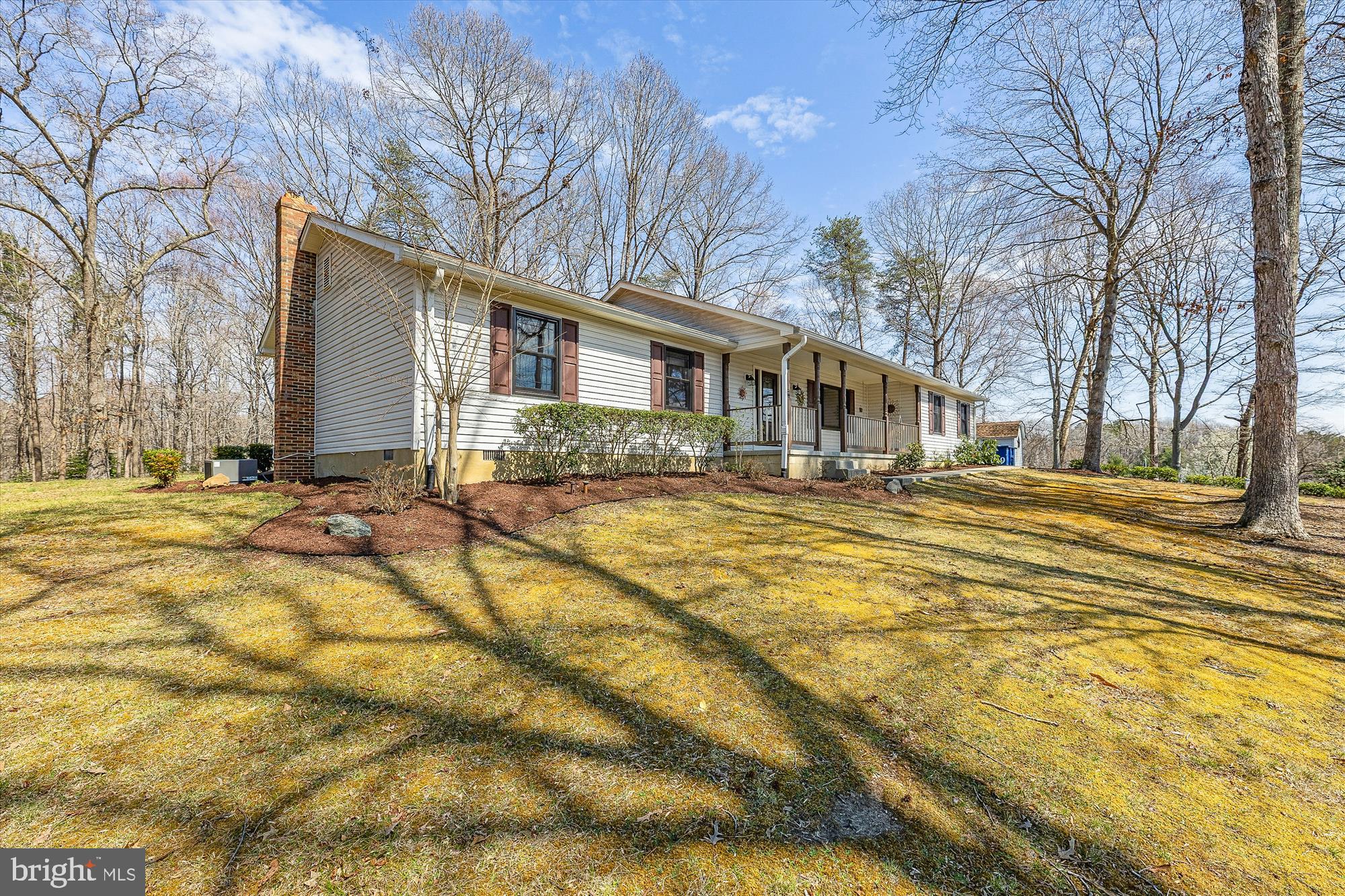 16130 Inheritance Drive Brandywine, MD 20613 - Photo 35 of 39 a front view of house with yard and trees around