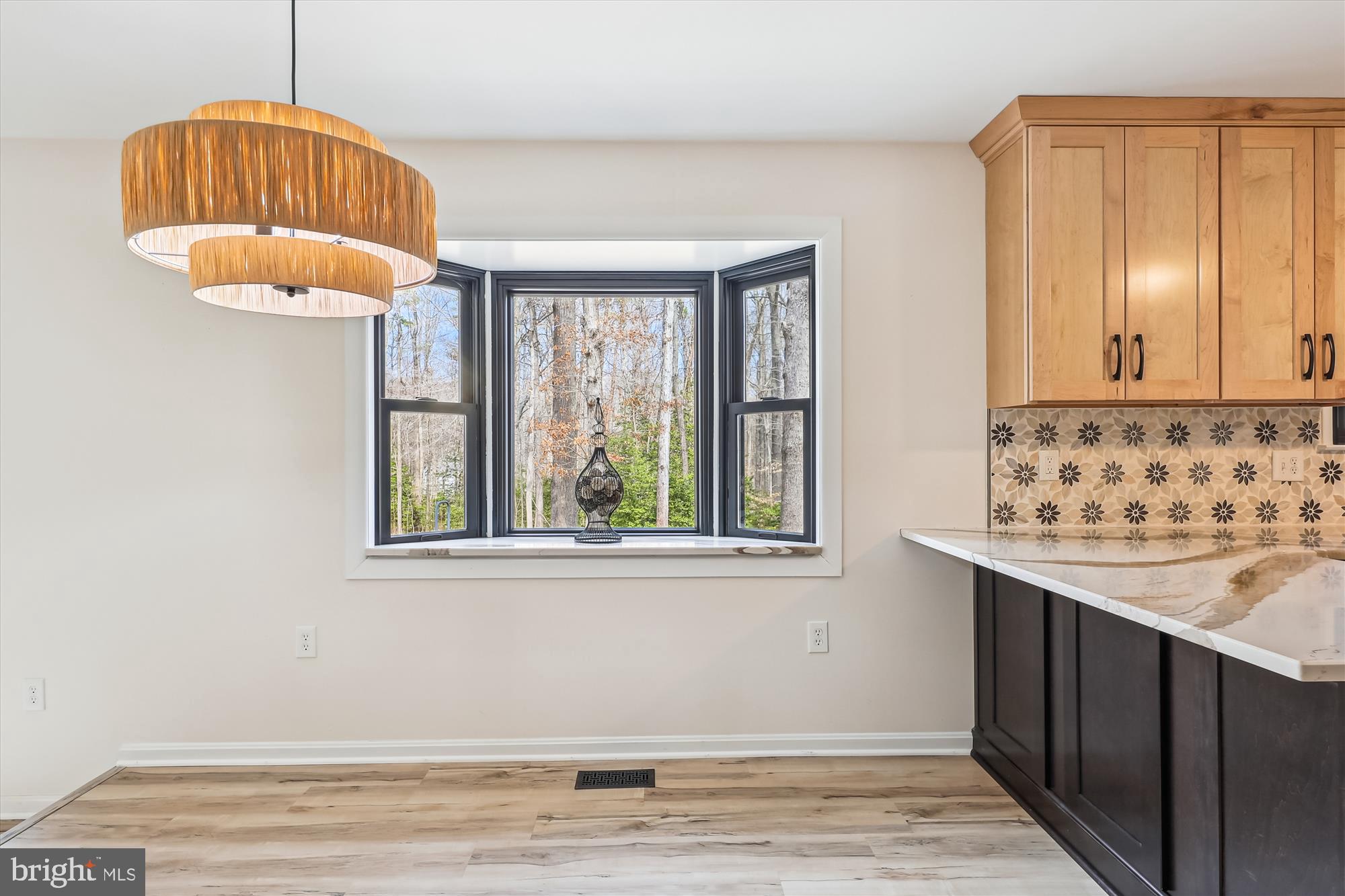 16130 Inheritance Drive Brandywine, MD 20613 - Photo 9 of 39 an empty room with window and cabinet