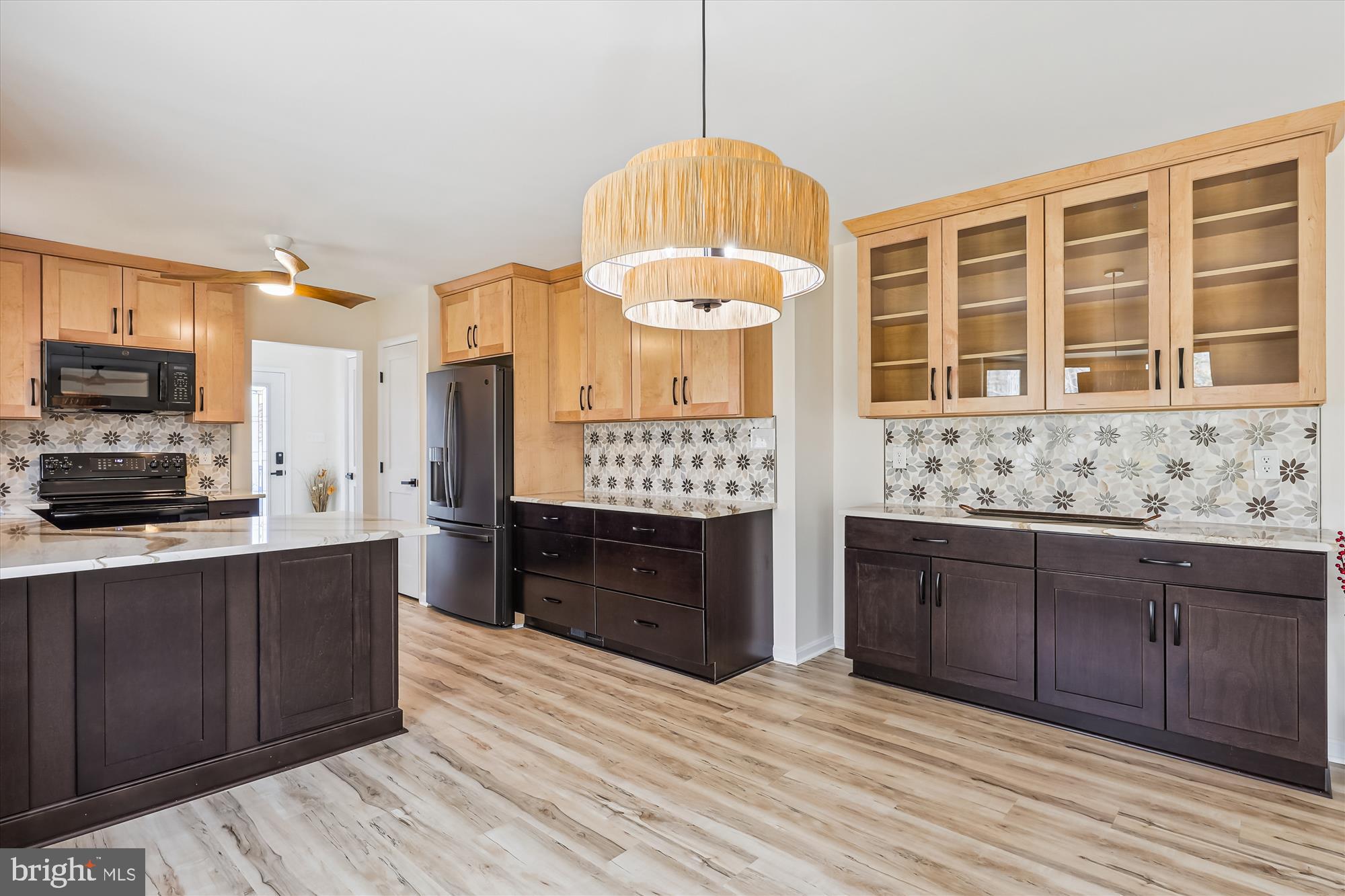 16130 Inheritance Drive Brandywine, MD 20613 - Photo 10 of 39 a kitchen with stainless steel appliances granite countertop a stove and cabinets