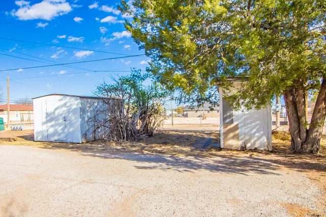 a view of a backyard of a house