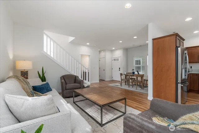 a living room with furniture and a table