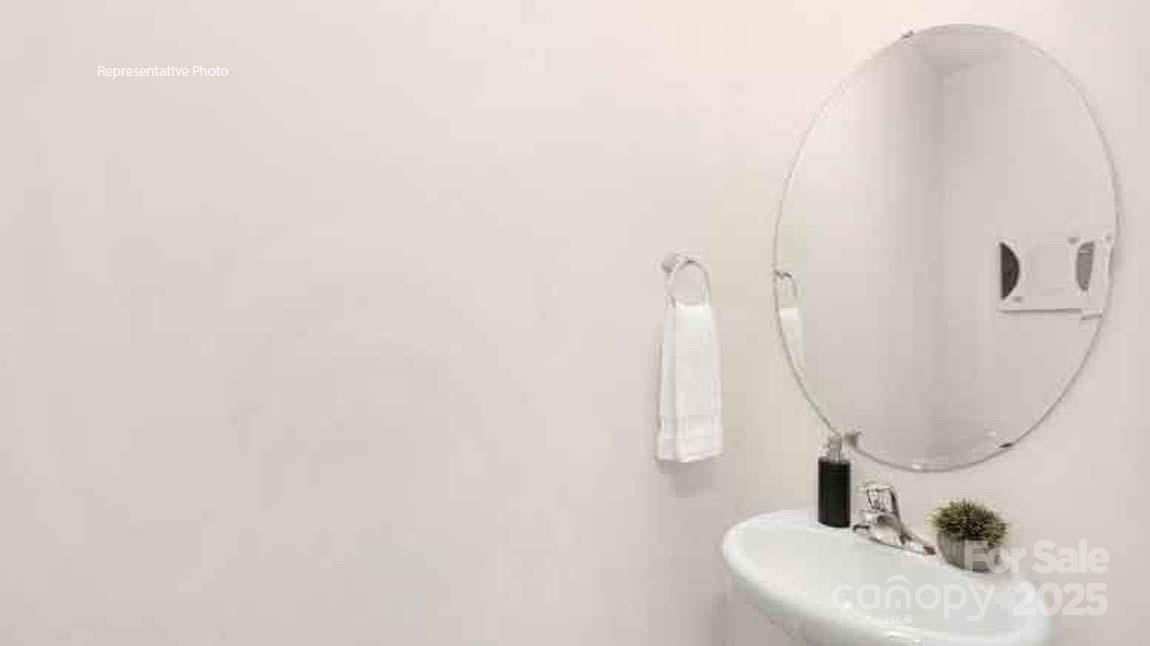 1047 Two Brothers Lane York, SC 29745 - Photo 14 of 18 a bathroom with a sink and a mirror