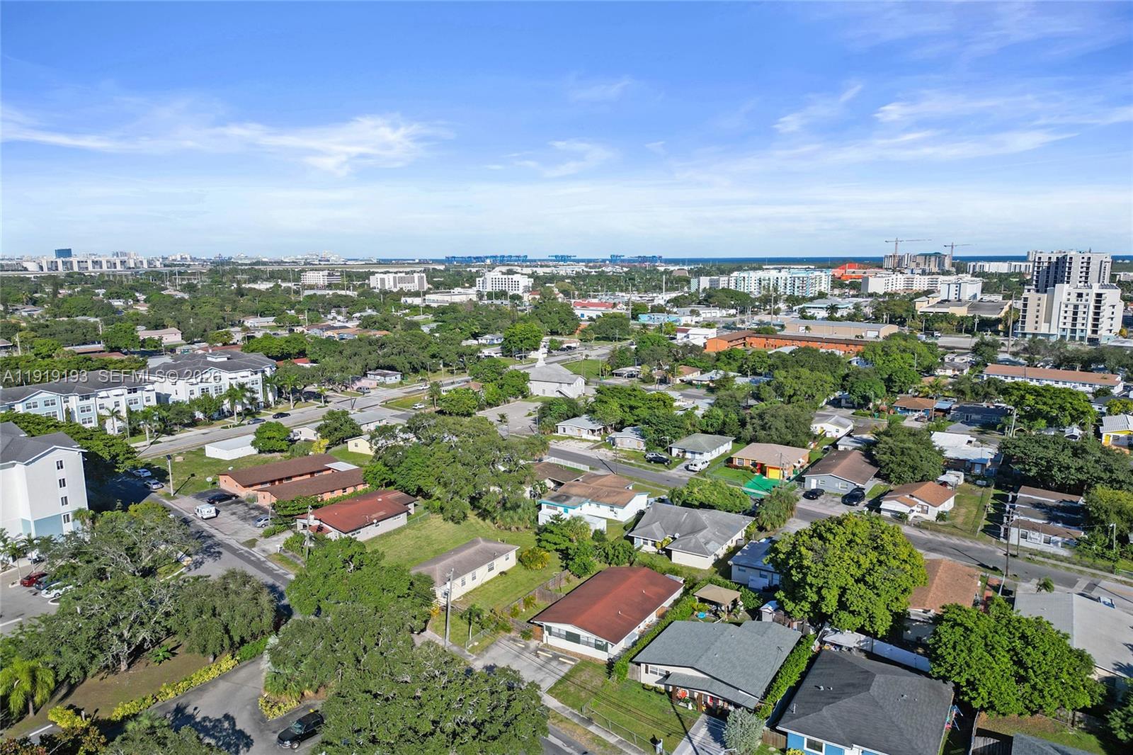 29 Southwest 8th Avenue, Unit 1 Dania Beach, FL 33004 - Photo 11 of 17 an aerial view of residential building with green space