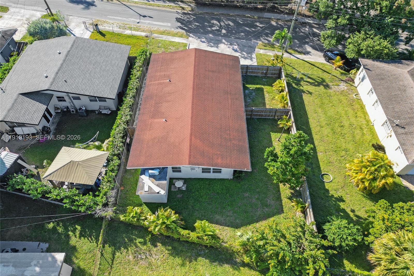 29 Southwest 8th Avenue, Unit 1 Dania Beach, FL 33004 - Photo 14 of 17 an aerial view of a house with a garden and swimming pool