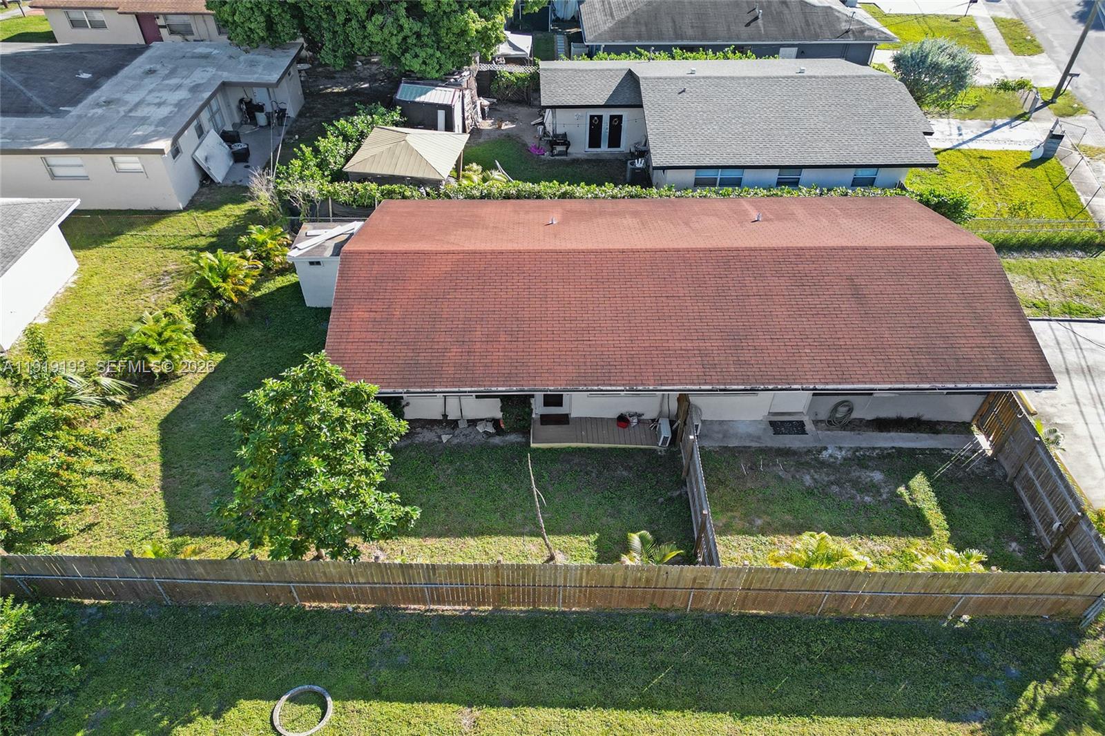 29 Southwest 8th Avenue, Unit 1 Dania Beach, FL 33004 - Photo 17 of 17 an aerial view of a house with a garden and lake view