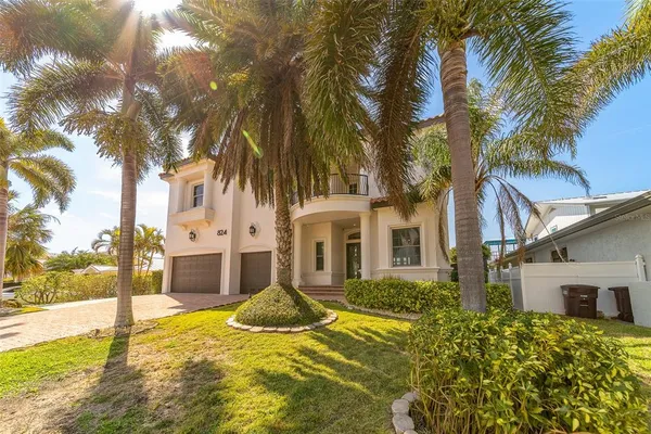 a kitchen with stainless steel appliances granite countertop a stove and a microwave oven
