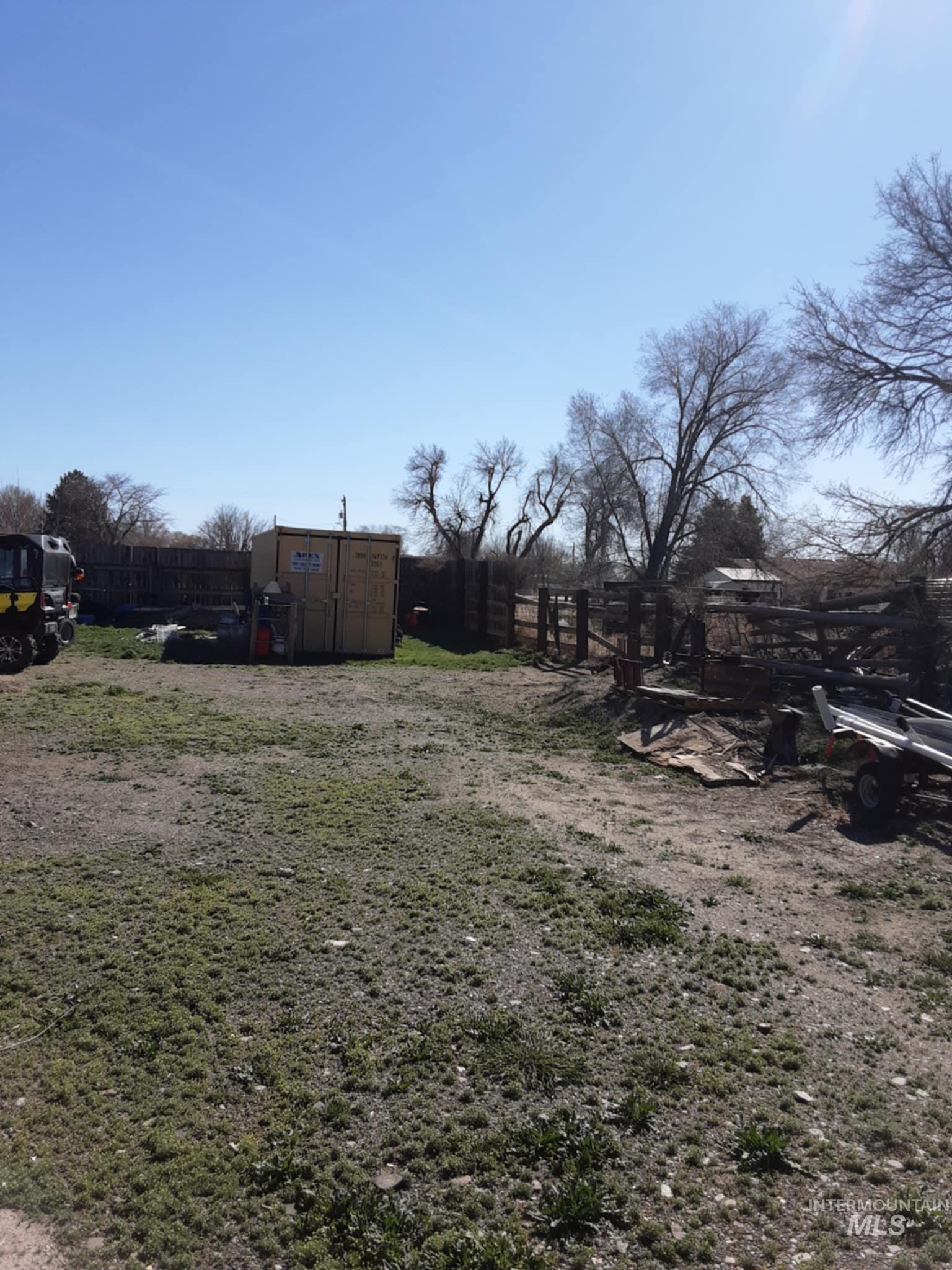 145 North Lincoln Avenue Oakley, ID 83346 - Photo 38 of 48 Fenced yard with a storage unit