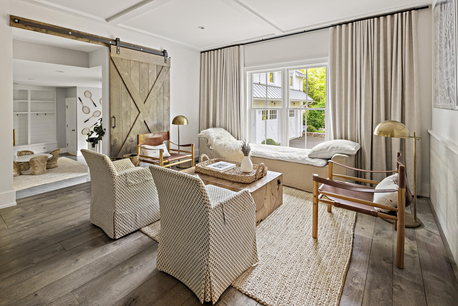 311 Mill Road New Canaan, CT 06840 - Photo 14 of 30 a living room with furniture and a large window