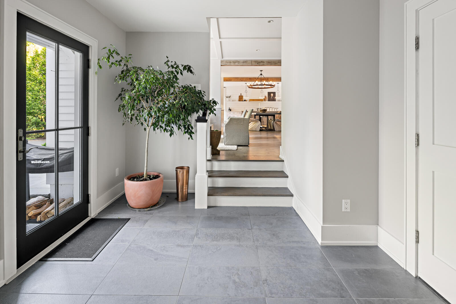 311 Mill Road New Canaan, CT 06840 - Photo 16 of 30 a view of outdoor space with a potted plant and windows