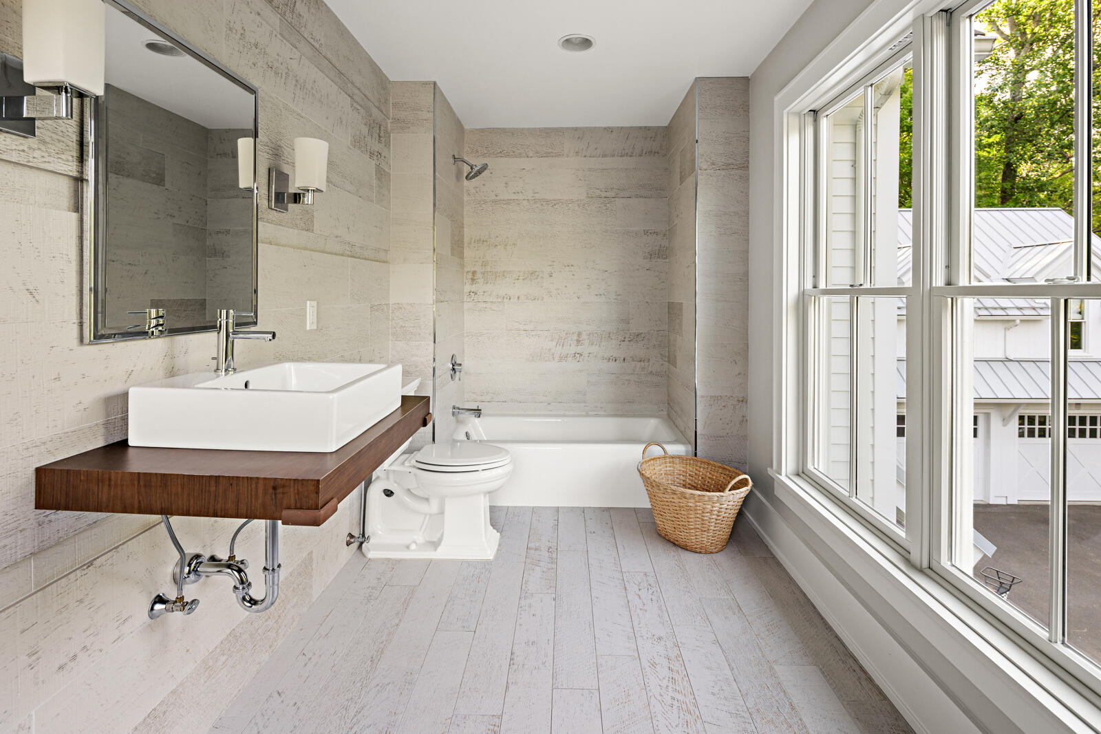 311 Mill Road New Canaan, CT 06840 - Photo 23 of 30 a bathroom with a toilet a sink and a bathtub