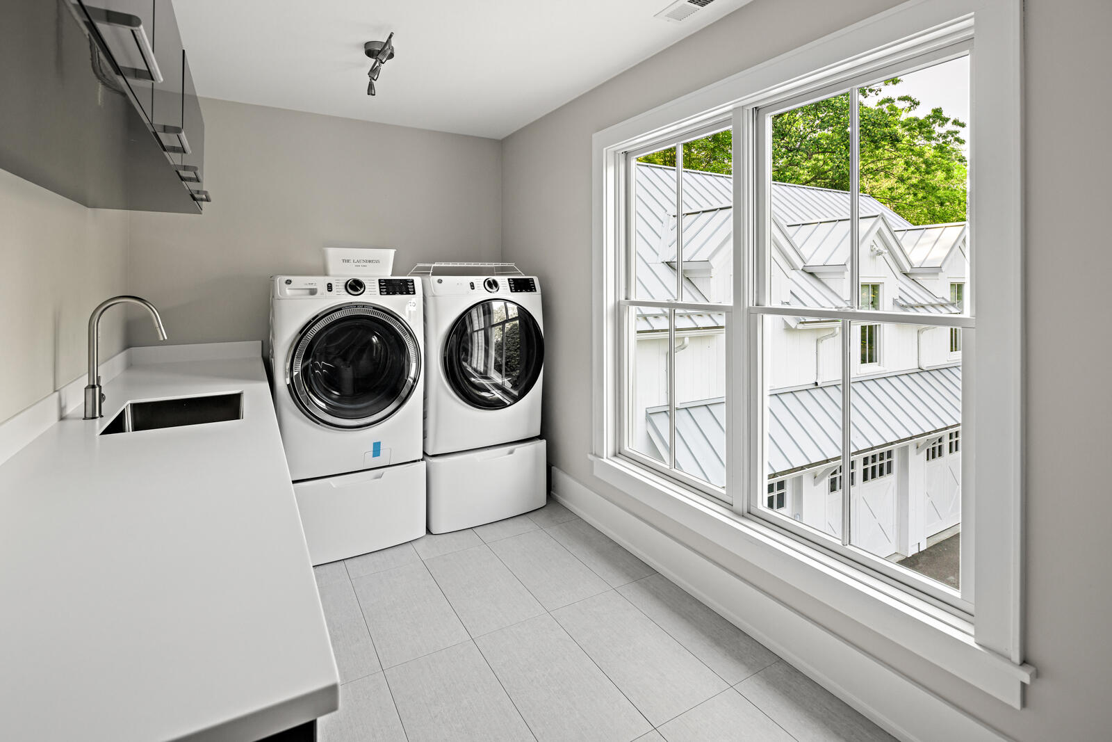311 Mill Road New Canaan, CT 06840 - Photo 28 of 30 a utility room with dryer and washer