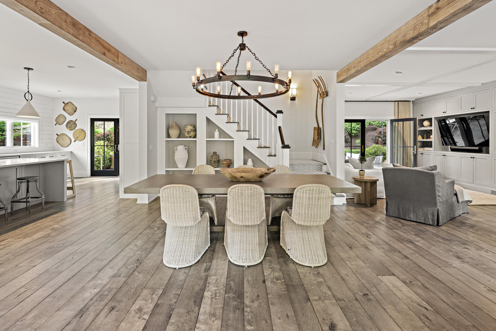 311 Mill Road New Canaan, CT 06840 - Photo 3 of 30 a dining room with furniture a chandelier and wooden floor