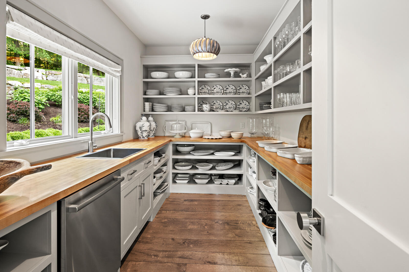 311 Mill Road New Canaan, CT 06840 - Photo 8 of 30 a kitchen with stainless steel appliances a sink and a stove