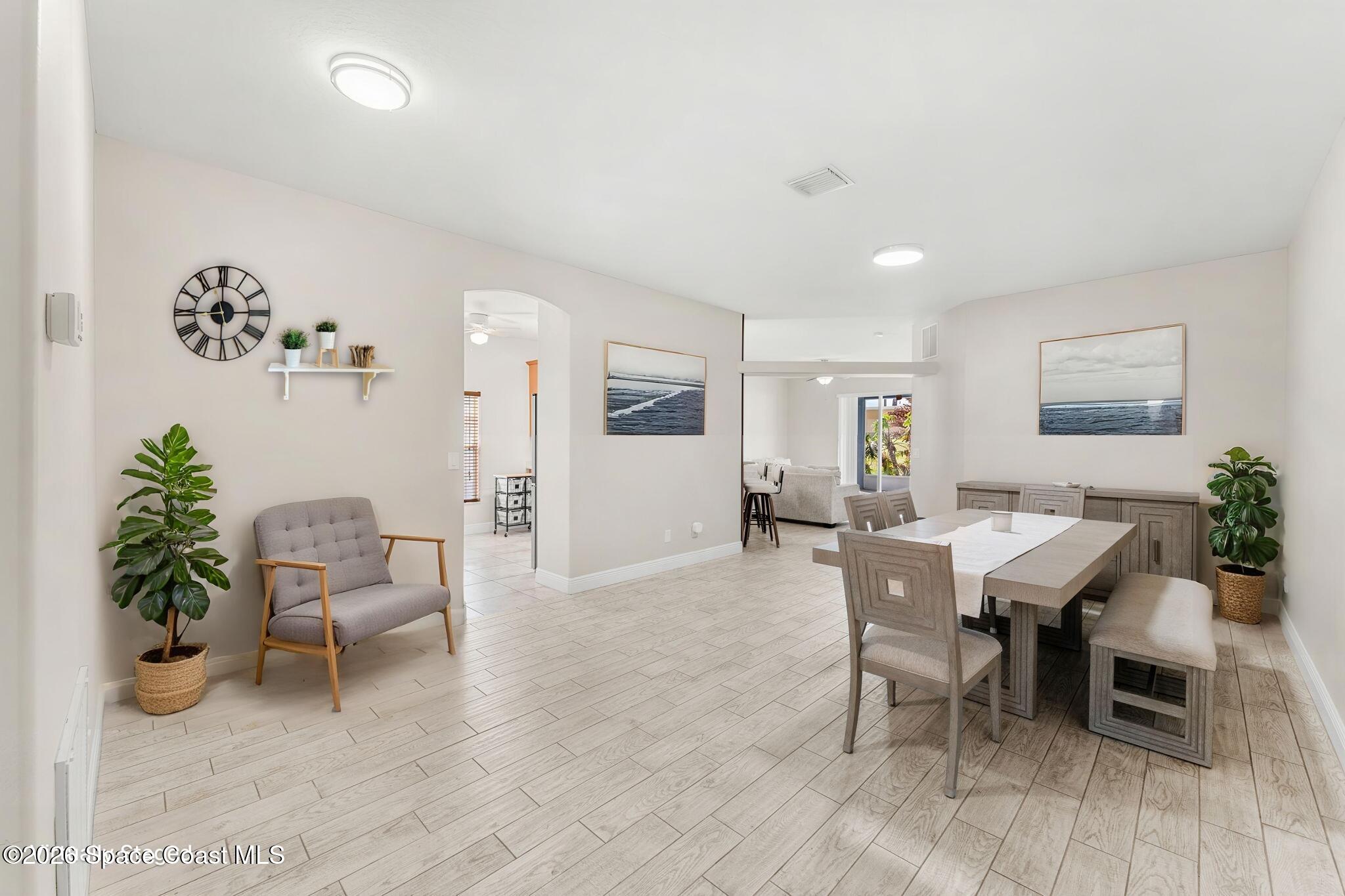 5389 Duskywing Drive Rockledge, FL 32955 - Photo 3 of 35 5389 Duskywing VS Dining Angle 1