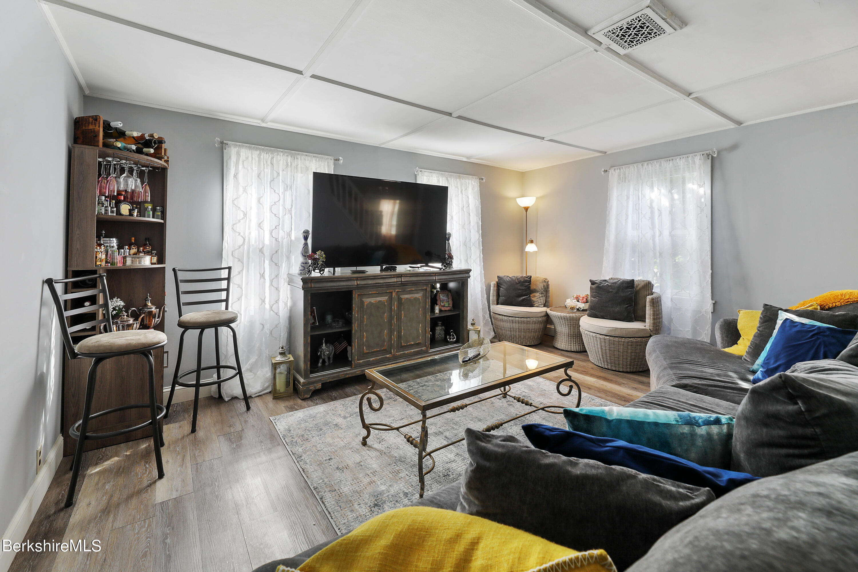 40 Summer Street Lee, MA 01238 - Photo 13 of 19 a living room with furniture and a flat screen tv
