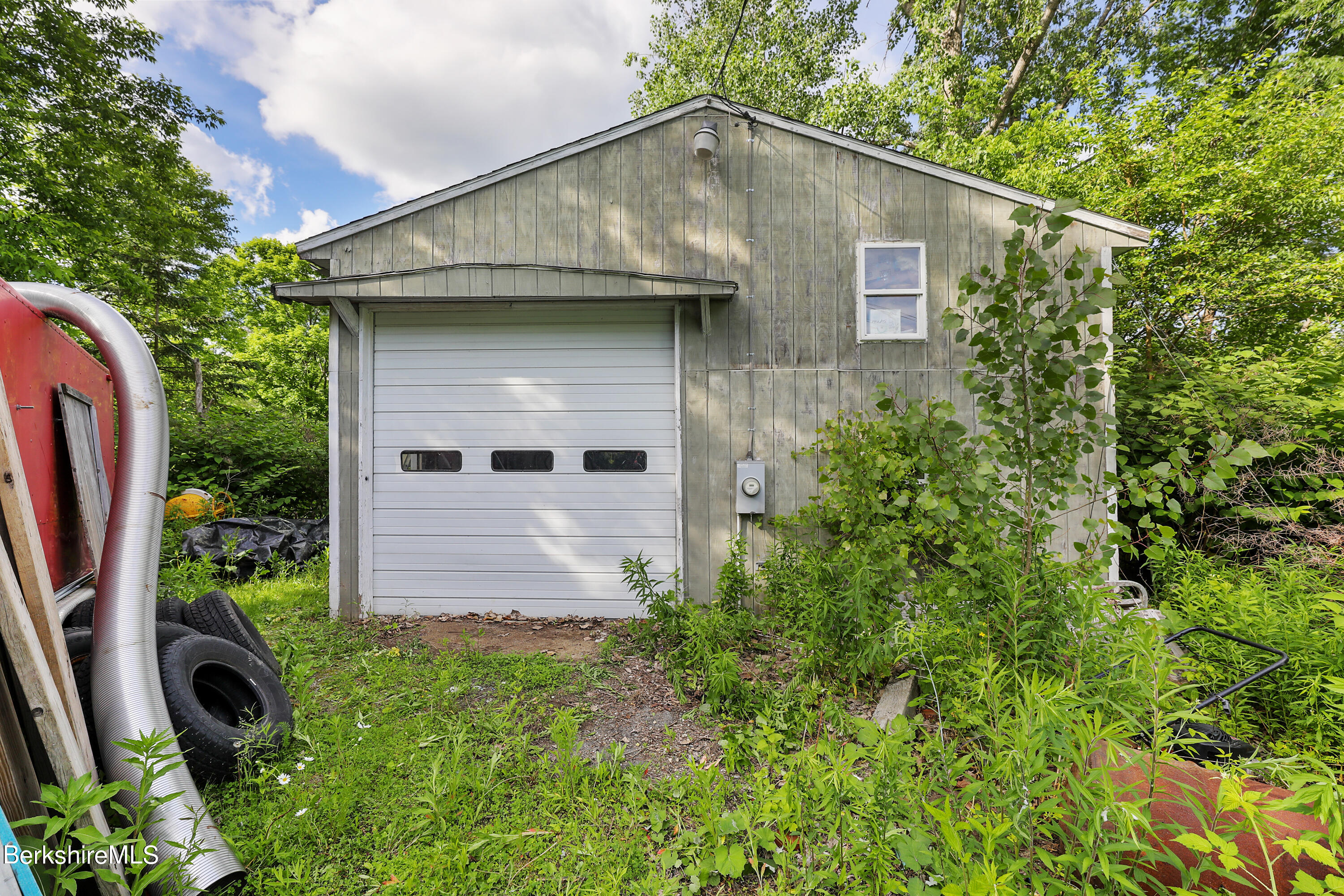 40 Summer Street Lee, MA 01238 - Photo 18 of 19 a front view of a house with garden