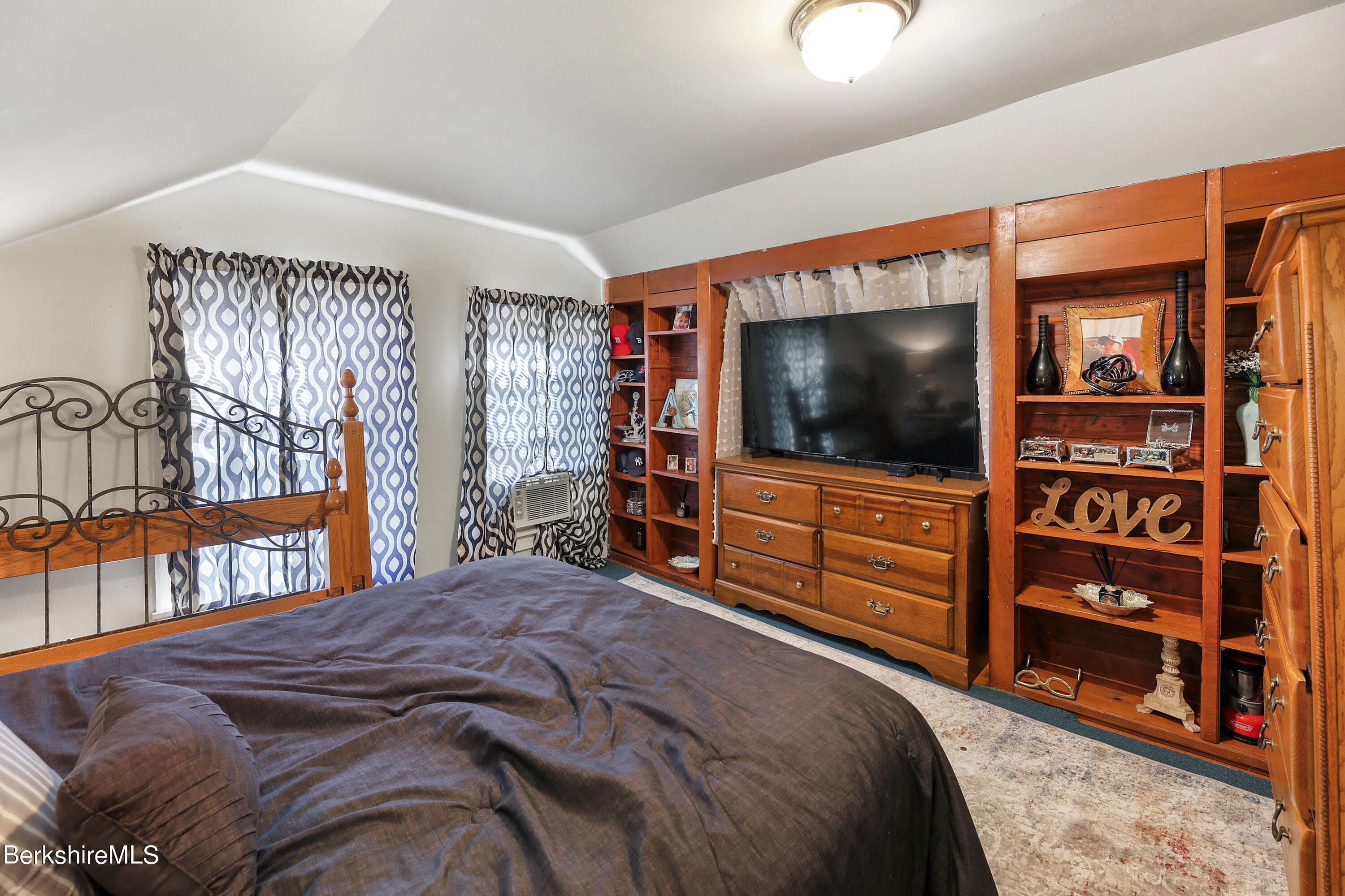 40 Summer Street Lee, MA 01238 - Photo 8 of 19 a bedroom with a bed and a flat screen tv