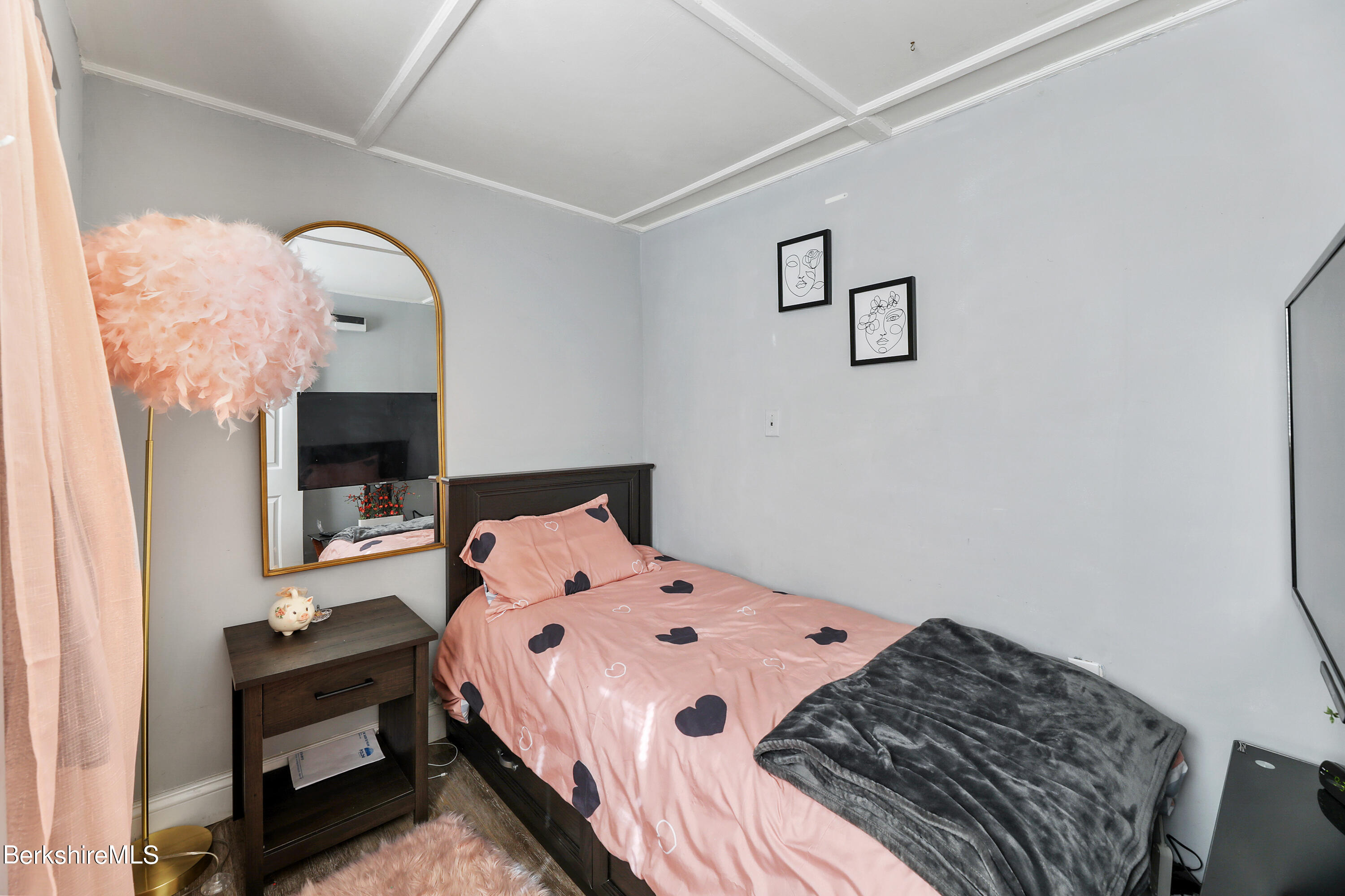 40 Summer Street Lee, MA 01238 - Photo 10 of 19 a bedroom with a bed and a flat screen tv