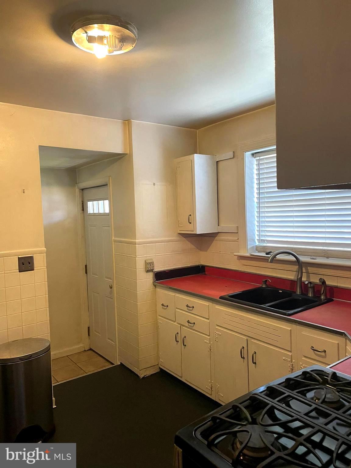 256 Line Road Kennett Square, PA 19348 - Photo 3 of 21 a kitchen with a sink and cabinets