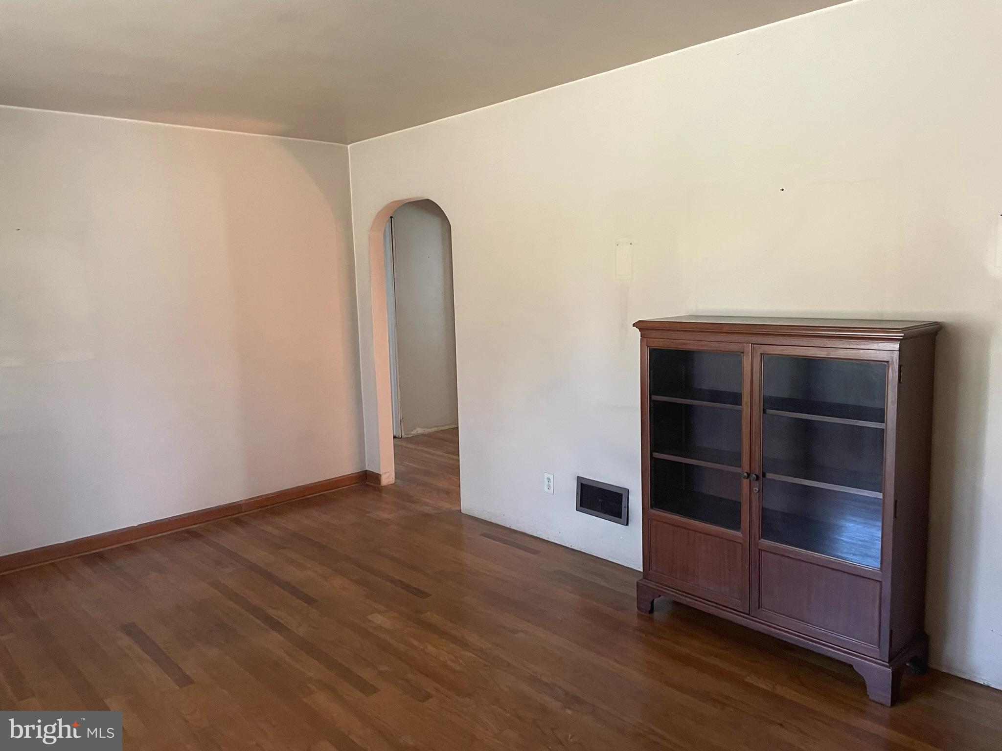 256 Line Road Kennett Square, PA 19348 - Photo 6 of 21 an empty room with wooden floor and windows
