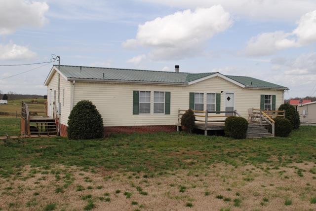 651 Cook Road Portland, TN 37148 - Photo 2 of 18 a view of a house with a back yard