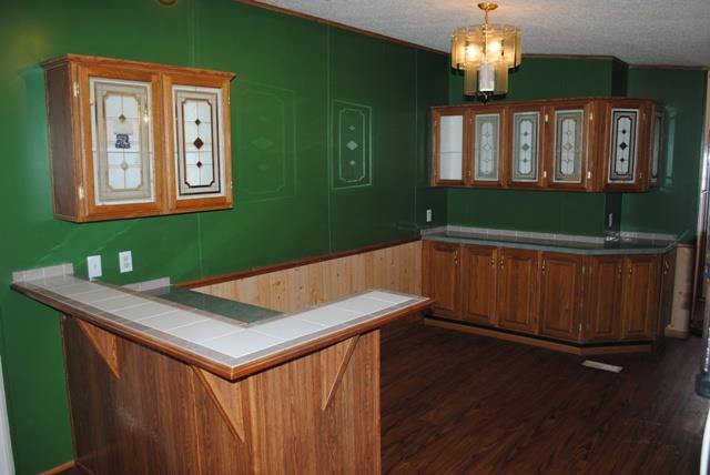 651 Cook Road Portland, TN 37148 - Photo 10 of 18 a view of a dining room with furniture window and wooden floor