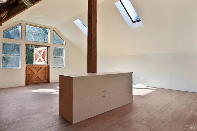 an empty room with windows