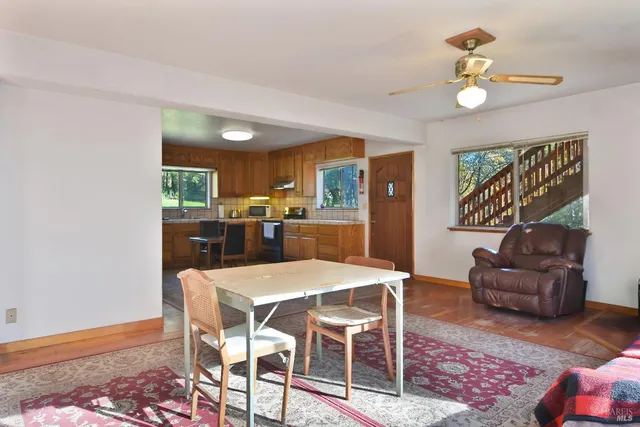 a view of a dining room with furniture