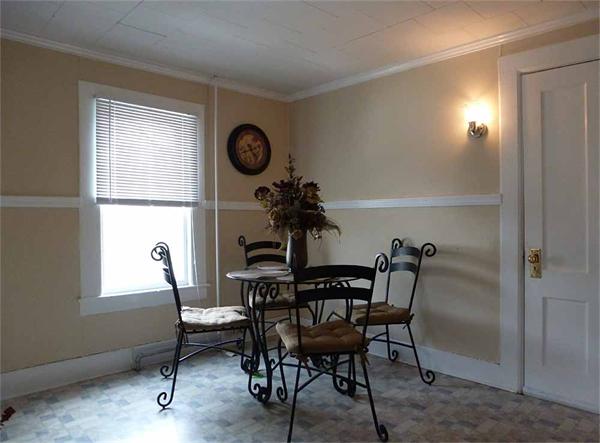 33 Greenleaf Street Springfield, MA 01108 - Photo 14 of 19 a view of a dining room and a window