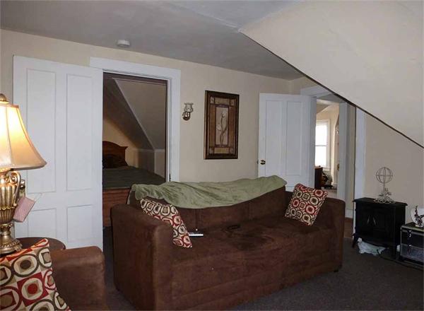 33 Greenleaf Street Springfield, MA 01108 - Photo 18 of 19 a living room with furniture flowerpot and window