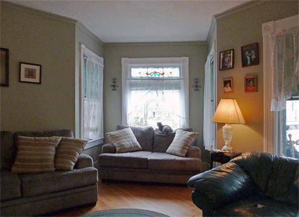 33 Greenleaf Street Springfield, MA 01108 - Photo 4 of 19 a living room with furniture and a window