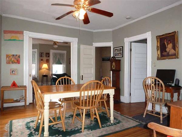 33 Greenleaf Street Springfield, MA 01108 - Photo 5 of 19 a view of a dining room with furniture and wooden floor