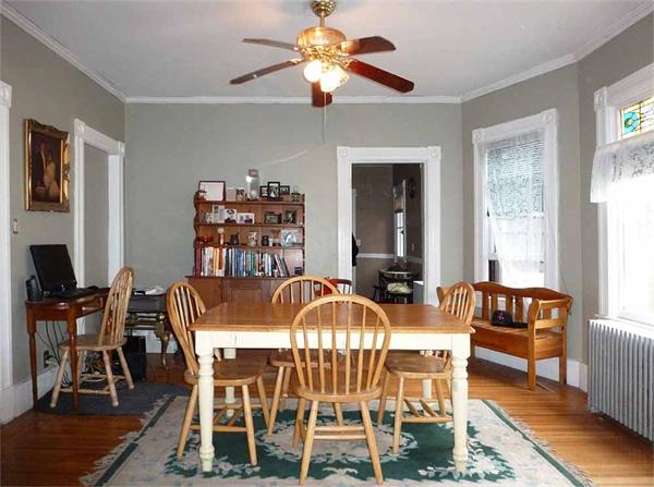 33 Greenleaf Street Springfield, MA 01108 - Photo 6 of 19 a view of a dining room with furniture window and wooden floor