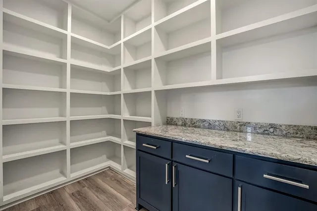 a view of a cabinets and window