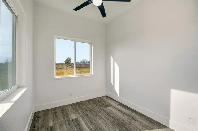 an empty room with windows