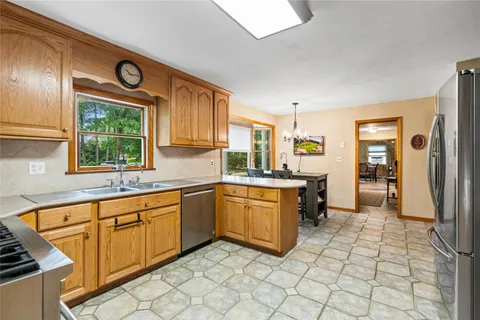 a kitchen with a sink and cabinets