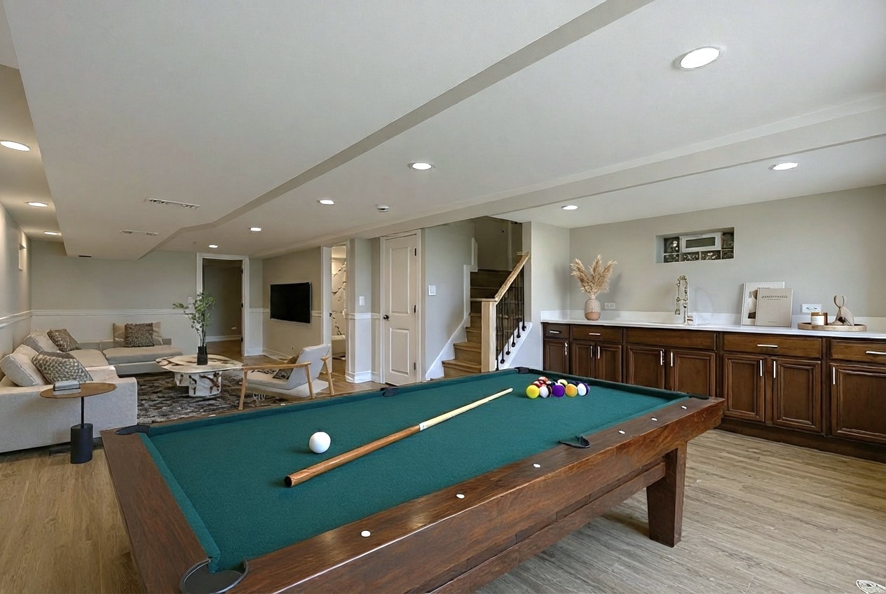 11250 South May Street Chicago, IL 60643 - Photo 13 of 22 a living room with kitchen pool table and chairs