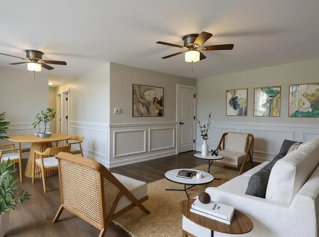 a living room with furniture and a table