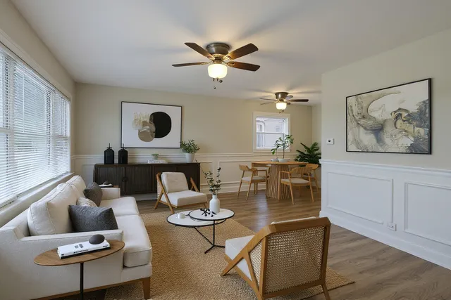a living room with furniture and a window