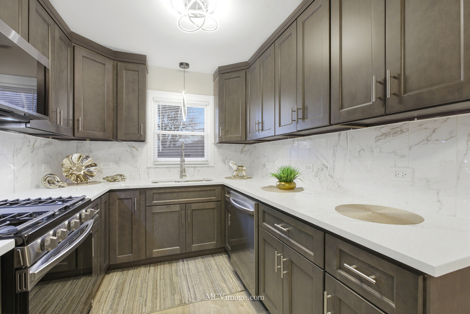 11250 South May Street Chicago, IL 60643 - Photo 5 of 22 a kitchen with a sink stove and cabinets