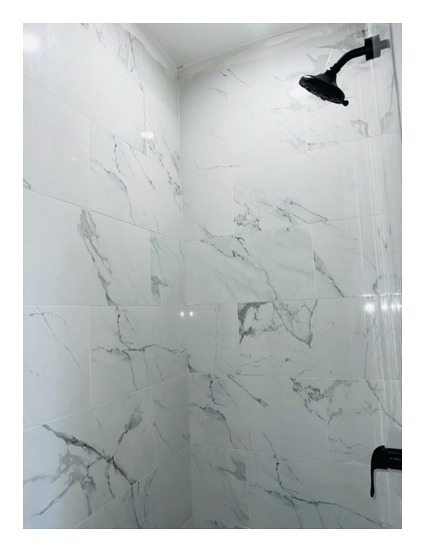 63 Water Street, Unit 22 Torrington, CT 06790 - Photo 6 of 6 a bathroom with shower