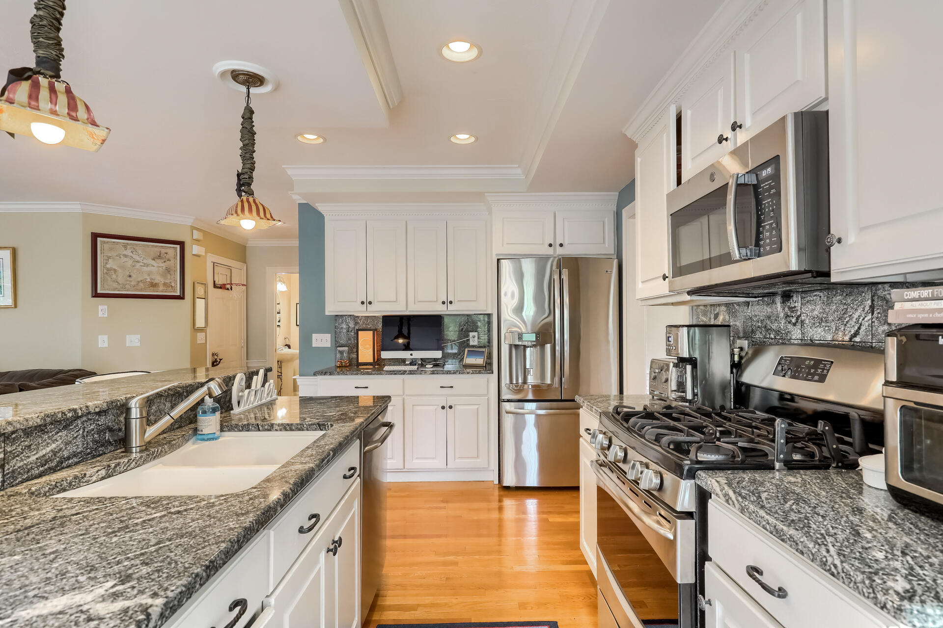 140 Great Marsh Road West Barnstable, MA 02668 - Photo 11 of 46 a kitchen with stainless steel appliances granite countertop a sink stove and refrigerator