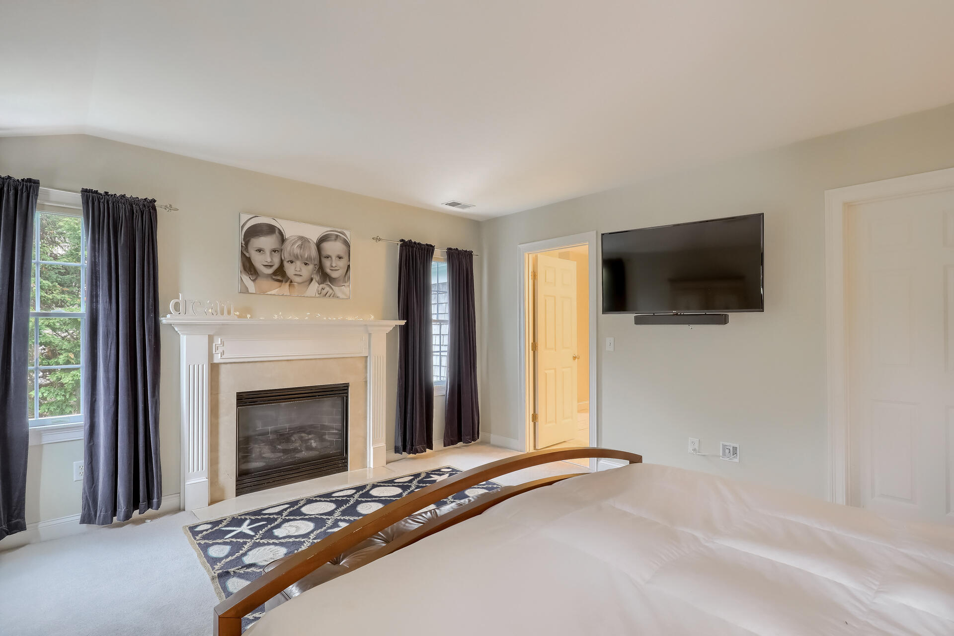 140 Great Marsh Road West Barnstable, MA 02668 - Photo 25 of 46 a view of a livingroom with an empty space and a fireplace