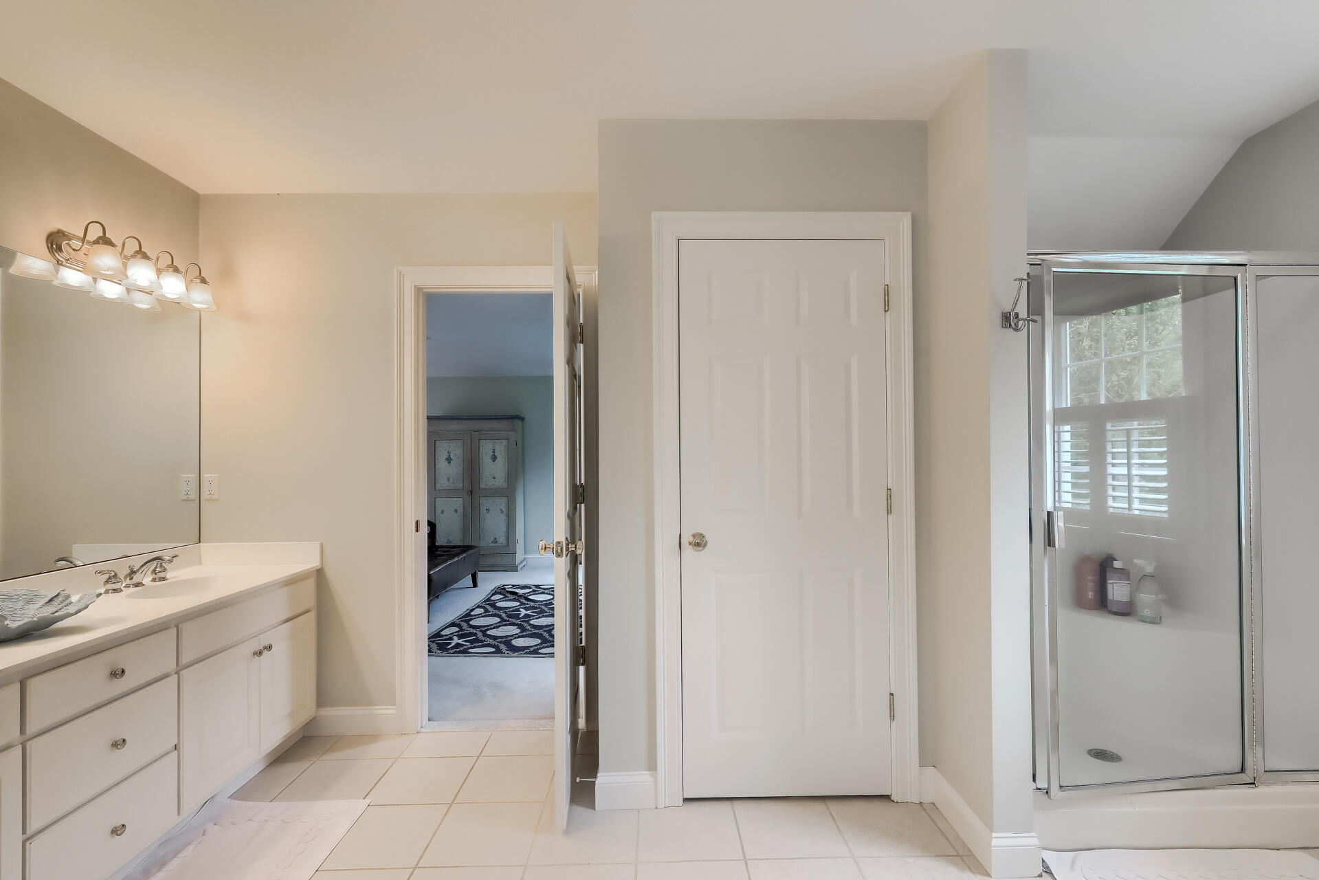 140 Great Marsh Road West Barnstable, MA 02668 - Photo 27 of 46 a en suite bathroom with a granite countertop sink a mirror and a shower