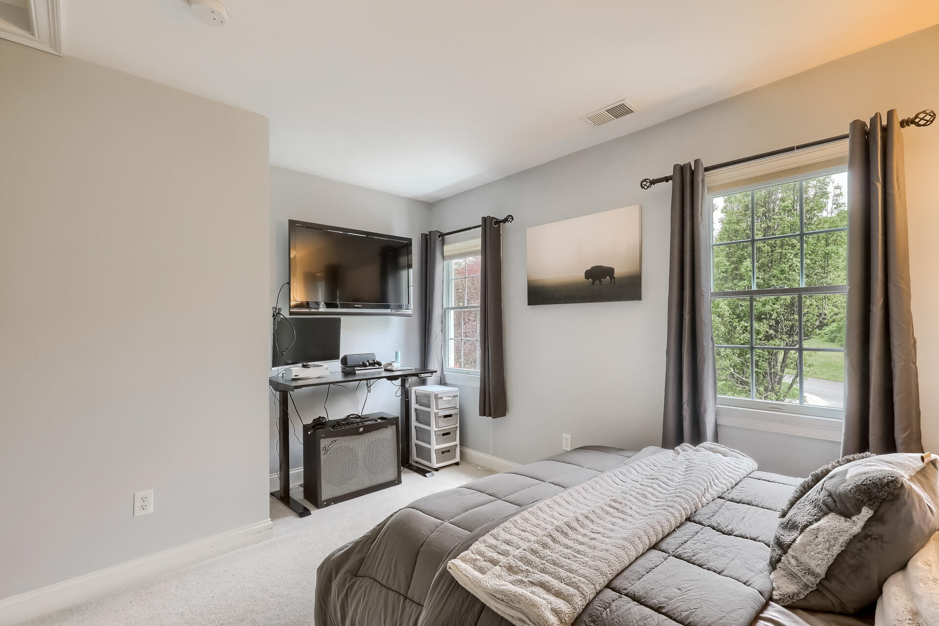 140 Great Marsh Road West Barnstable, MA 02668 - Photo 32 of 46 a bedroom with a bed and a flat tv screen on the dresser