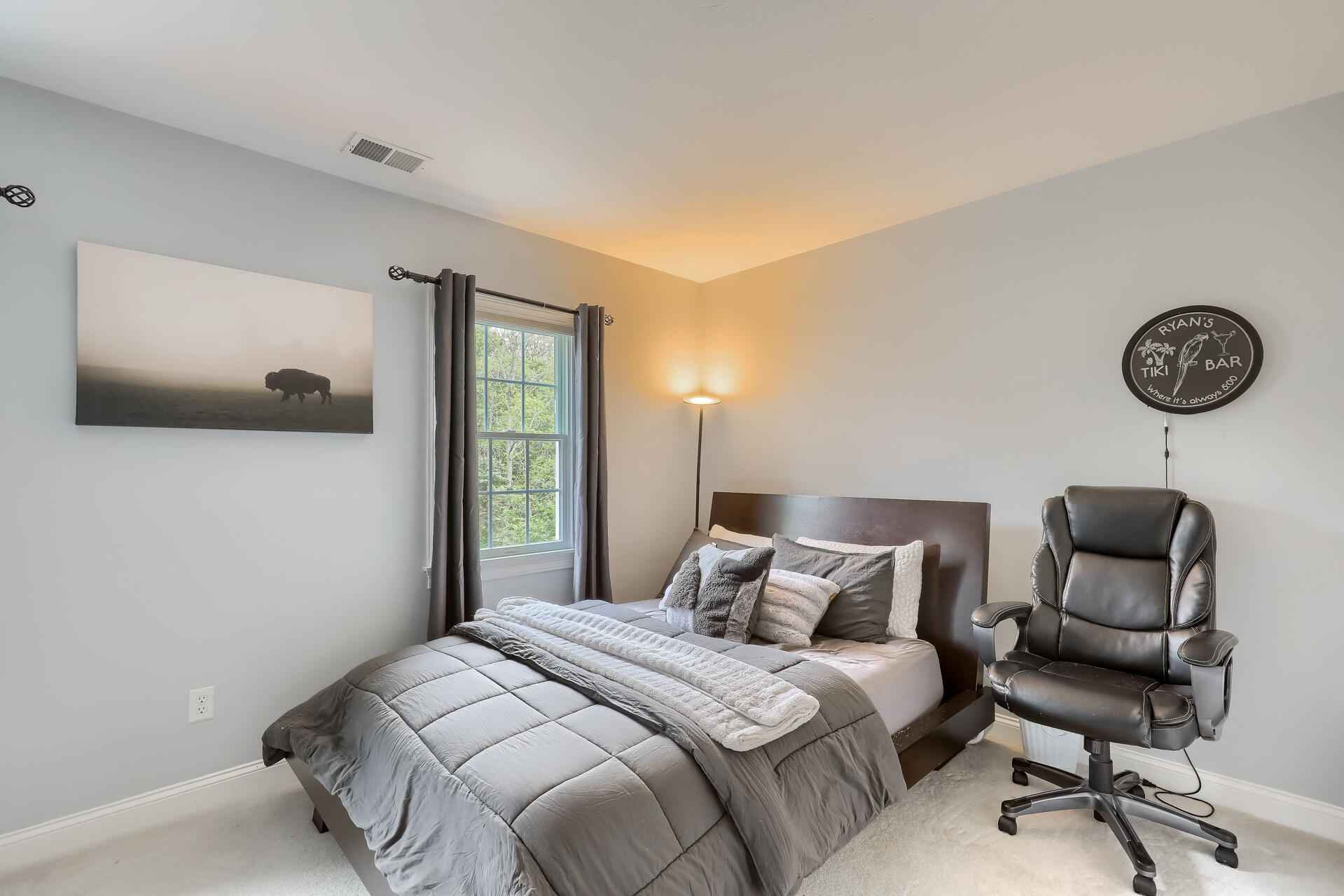 140 Great Marsh Road West Barnstable, MA 02668 - Photo 33 of 46 a bedroom with a bed and a chair