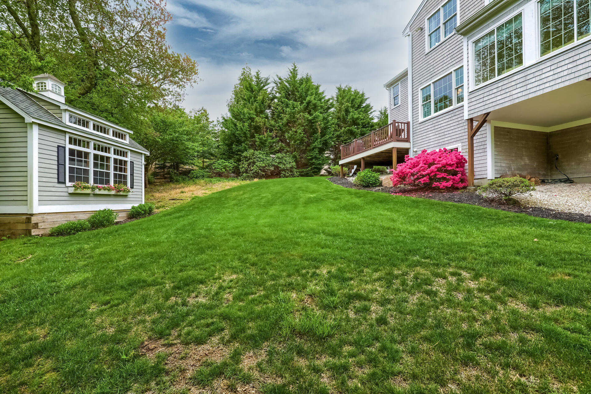 140 Great Marsh Road West Barnstable, MA 02668 - Photo 37 of 46 a front view of a house with garden