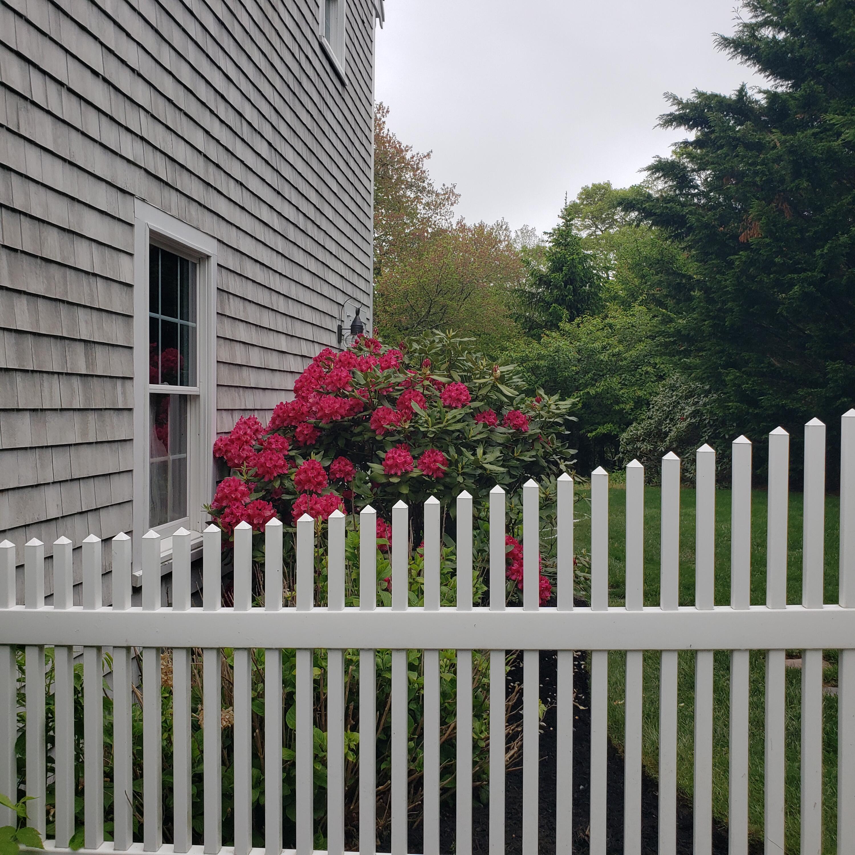 140 Great Marsh Road West Barnstable, MA 02668 - Photo 42 of 46 a view of a house with a wooden fence