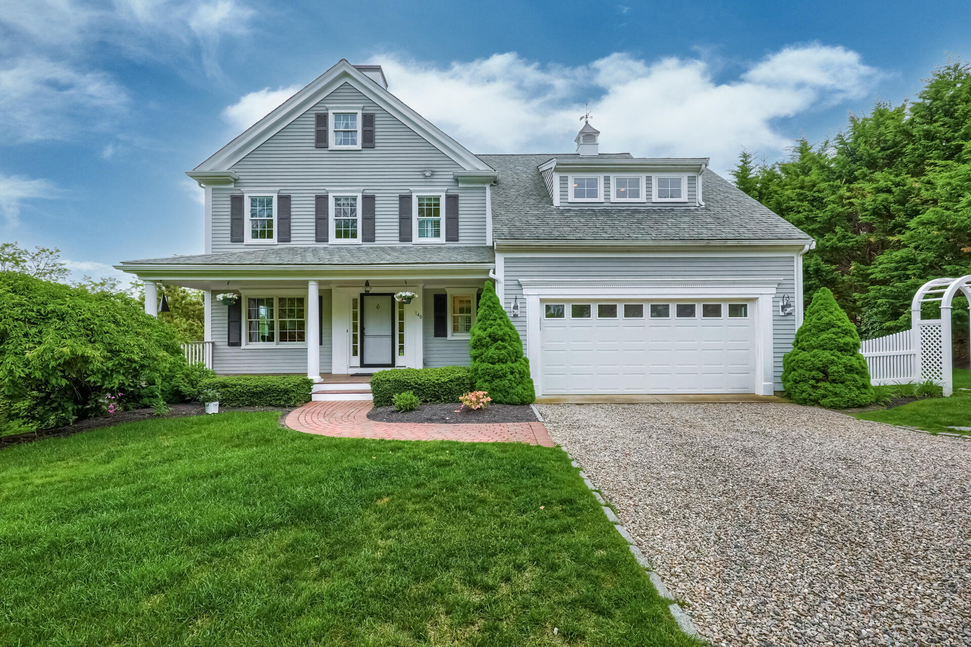 140 Great Marsh Road West Barnstable, MA 02668 - Photo 44 of 46 a view of an white house with a yard